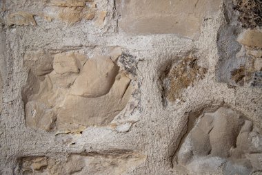 Eski Taş Duvarın Dokulu Yüzeyi ve Doğal Tonları ile Yakın Çekimi