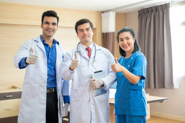 Doctors group,Portrait of smiling team of doctors and nurses at hospital.