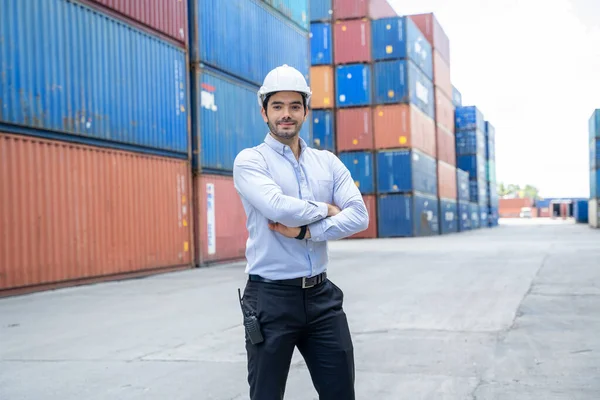 Businessman working in the construction container yard at container depot station for Logistic Import Export