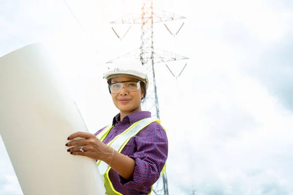 Woman electrical engineer working about project electrical designs.