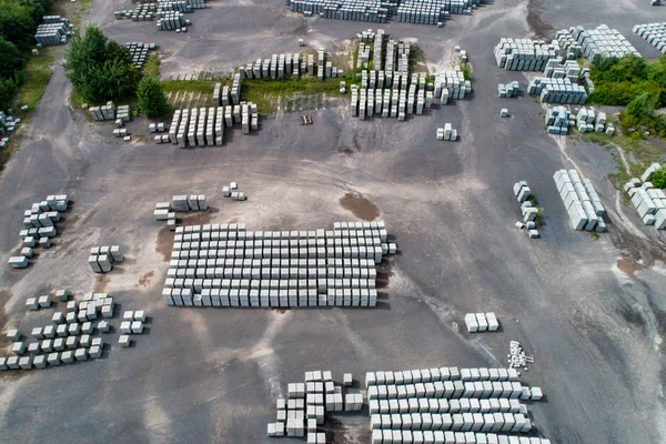 Aerial view of factory for Blocks of concrete stones Building materials industry products for homebuilding construction — Stock Image Aerial view of factory for Blocks of concrete stones Building materials industry products for homebuilding construction Royalty Free Stock Photos