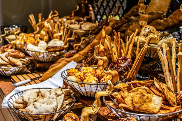 Bread bar station buffet catering, close-up Assortment of fresh pastry on table Pastry buffet set for breakfast in Egypt — Stock Photo, Image