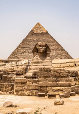 Egyptian Great Sphinx full body portrait head,with pyramids of Giza background Egypt empty with nobody. copy space clipart