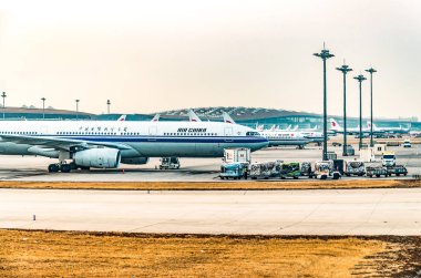 Bejing, Çin, 23.02.2019 Air China Airbus çift motorlu jet yolcu uçağı ayakta havaalanında uçuş için bekliyor