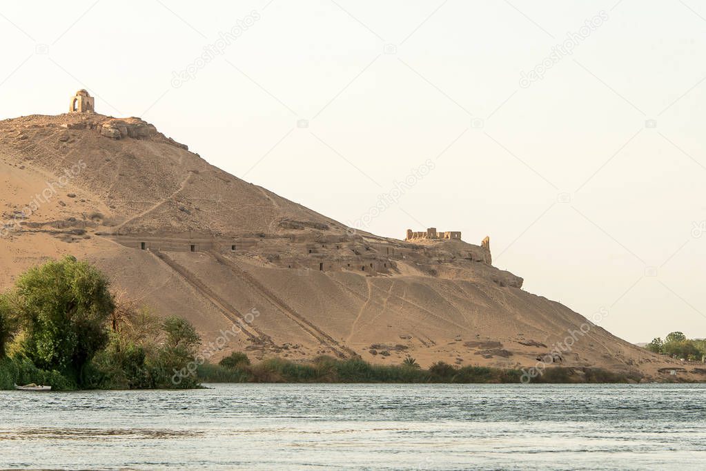 Tombs of the Nobles in Aswan, Egypt rock cut graves cementary located near nile river