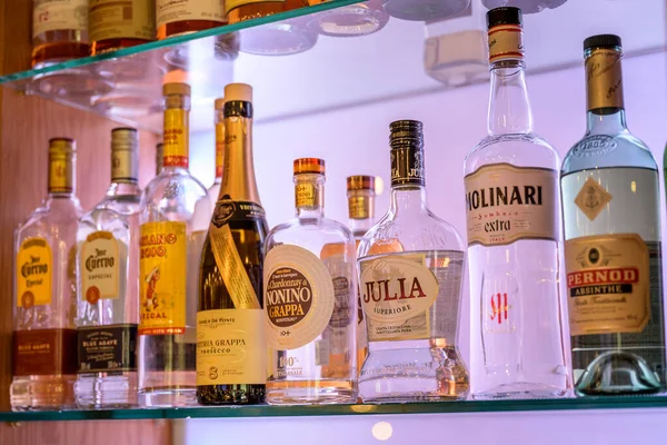 Grenzau Németország 27.07.2019 - Bitters and liquor bar counter with different bottles vintage style ambient light — Stock Fotó