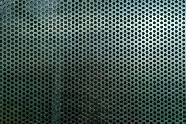 Rejilla metálica perforada, fondo industrial. Placa de acero con agujeros — Foto de Stock