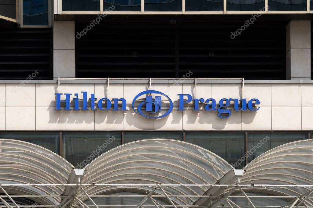 PRAGUE, CZECHIA - 30. May 2025: Hilton Prague logo sign of the American hotel brand on a building. Business in the hospitality and travel industry. Close-up of the exterior of the house.