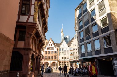 People walking by in Frankfurt old town in September