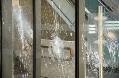 Protests terrorists terrorist attack broken window glass subway showcase rebellion, confrontation, lawlessness, crime, riots  clipart