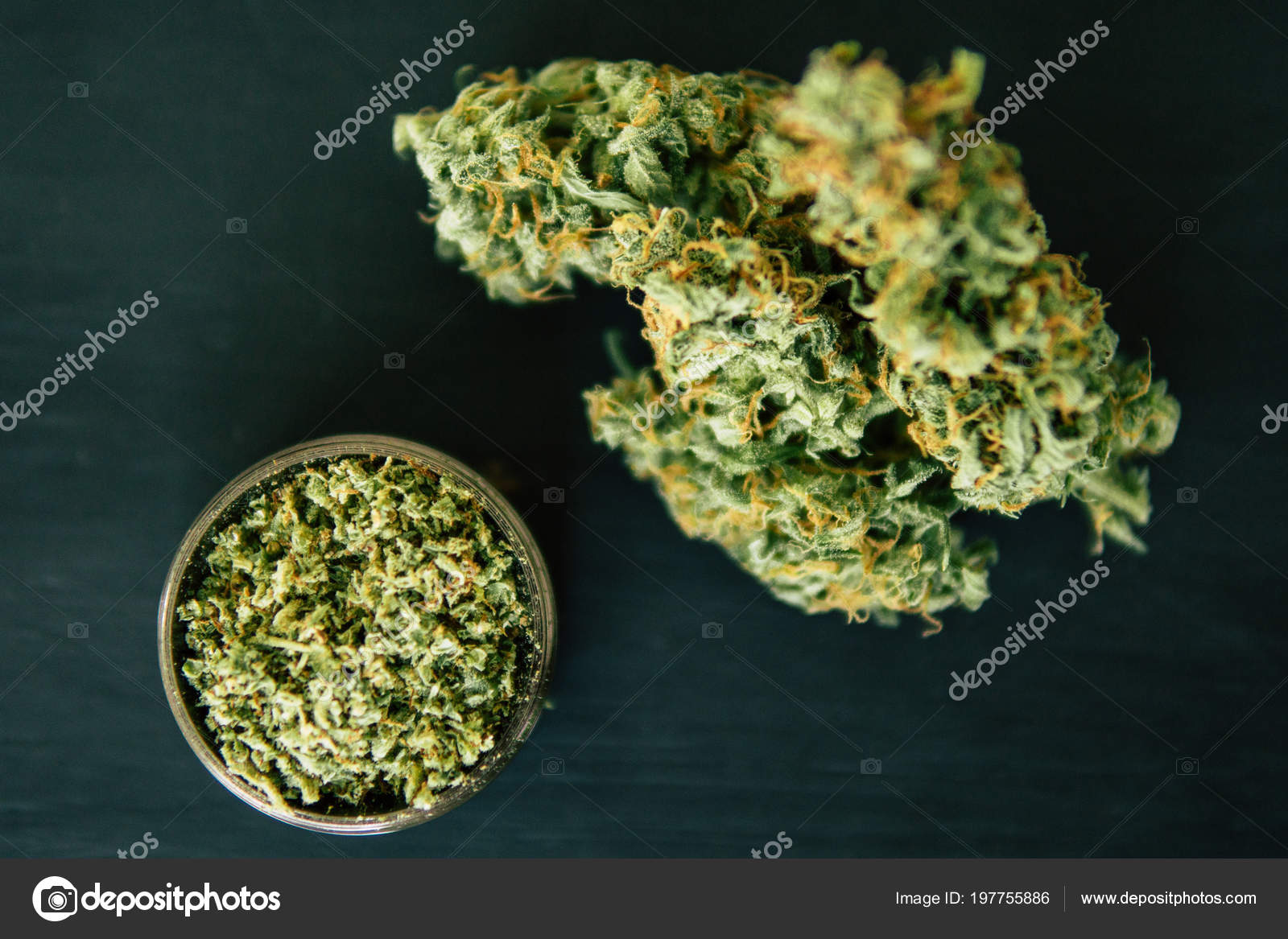 Weed grinder Fresh marihuana. Cannabis buds on white wood background. Copy  space. Close up. Blunt and Lighters. CBD and THC on buds in cannabis. Stock  Photo