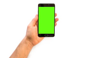 Online ödeme plastik kart A adam bir smartphone ile yeşil perde için chroma anahtar zorunlu tutan