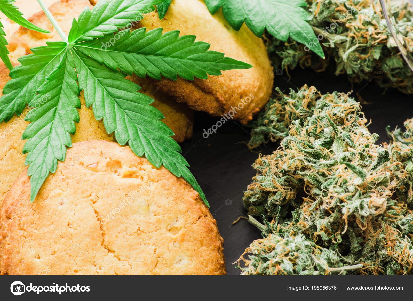 Cooking With Cannabis Herb Cookies With Leaves Of Cannabis And Buds Of Marijuana On The Tab Stock Photo Image By C Cendeced 198956376