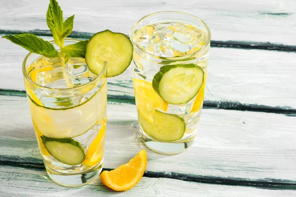 Fresh cucumber water with lemon and mint.