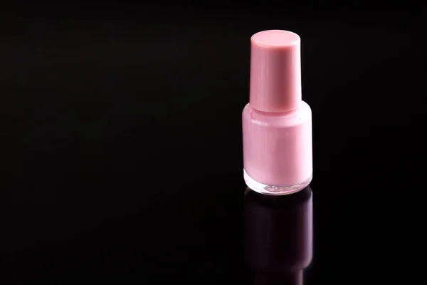 Nail polish on black background — Stock Photo, Image