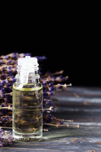 Lavender flowers and herbal oil. Selective focus.