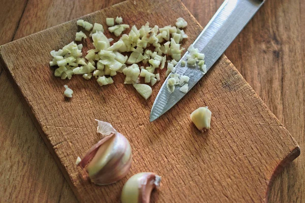 Closeup Cut Garlic Cutting Board Stock Image