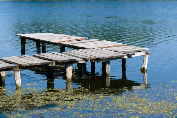 Old wooden pier over the river
