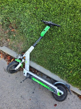 Broken scooter BOLT on the sidewalk. Varna.  Bulgaria.  15.09.2025