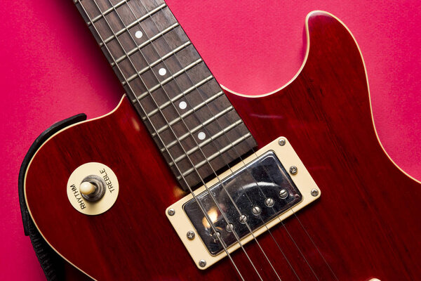 Closeup view of vintage classic electric rock les paul guitar.