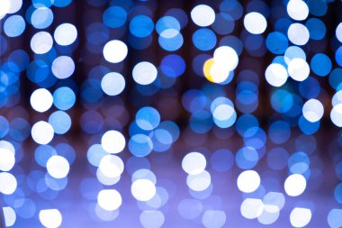 Arka plan bokeh mavi ışıklar.