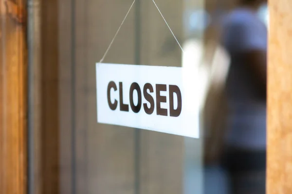 The sign is closed on door of store. — Stock Photo, Image