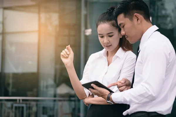 Two People Looking Smartphone Analyzing Stock Graphs Morning Going Work — Stock Photo, Image