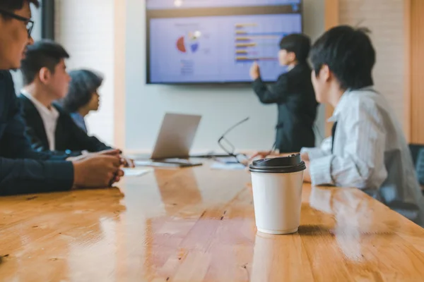 Close up coffee cup in the boardroom. — Stock Photo, Image