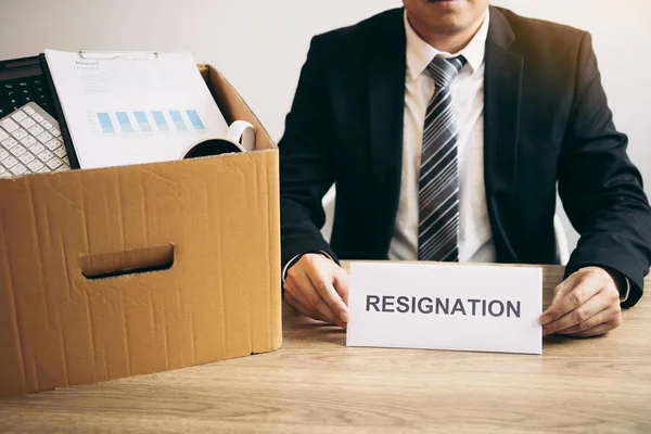 Male employee was sad at his desk when he received a contract en — Stock Photo, Image