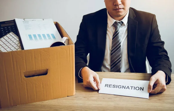 Male employee was sad at his desk when he received a contract en — Stock Photo, Image