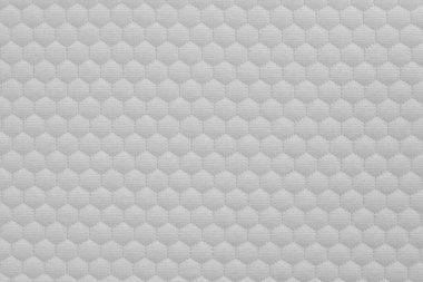 Yatak örtüsünün soyut beyaz dokusu veya yastık yüzeyi arkaplanı kapat