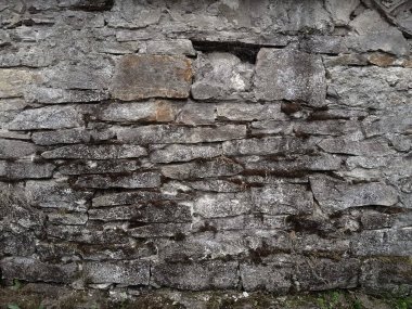 Çok eski taş duvar desenli fotoğrafın arkaplanı.