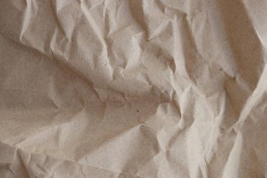 Kahverengi buruşmuş geri dönüşümlü kağıt doku arka planı. Kahverengi buruşmuş geri dönüşümlü karton yaprağın Kraft Kağıt dokusu arka planı