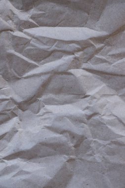 Kahverengi buruşmuş geri dönüşümlü kağıt doku arka planı. Kahverengi buruşmuş geri dönüşümlü karton yaprağın Kraft Kağıt dokusu arka planı