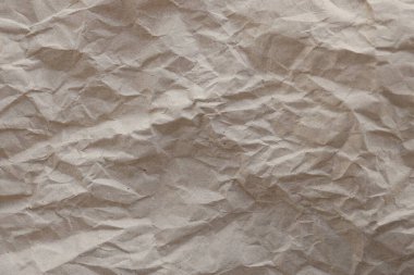 Kahverengi buruşmuş geri dönüşümlü kağıt doku arka planı. Kahverengi buruşmuş geri dönüşümlü karton yaprağın Kraft Kağıt dokusu arka planı