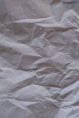 Kahverengi buruşmuş geri dönüşümlü kağıt doku arka planı. Kahverengi buruşmuş geri dönüşümlü karton yaprağın Kraft Kağıt dokusu arka planı