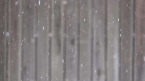 Slow Motion Snow Flakes Falling Defocused Wooden Fence Background — Stock Video