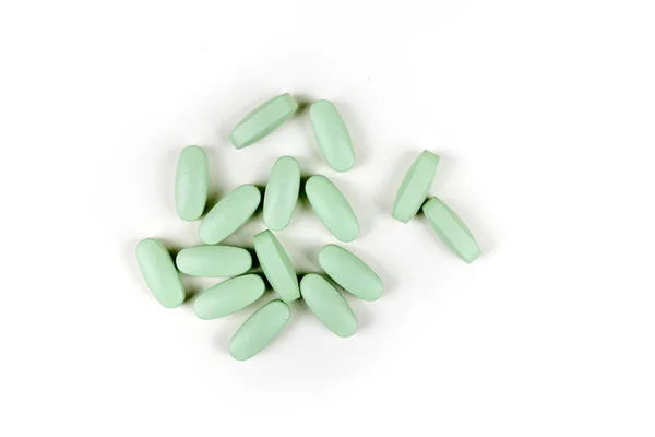 Scattered Green Pills White Background — Stock Photo, Image