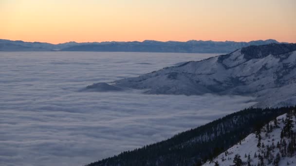 Cloudy Inversion Sunrise Next Mountain Waves Lapping — Stock Video