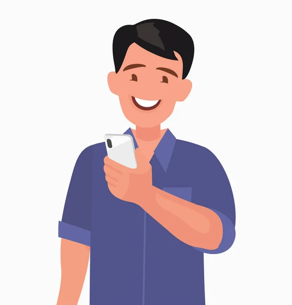 Mutlu adamın elinde akıllı telefon var. Kişi ve alet. Ağ içindeki iletişim.