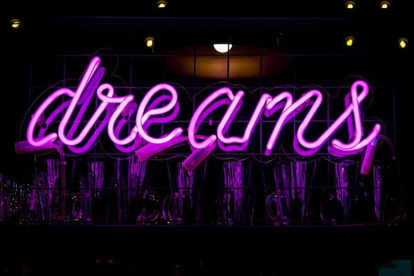 Glowing Purple Neon Inscription DREAMS