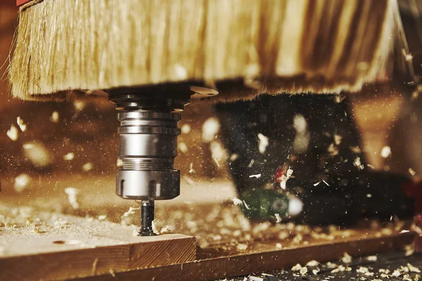 Close-up shot of machine with numerical control cuts wood. Cnc tool. — Stock Photo, Image