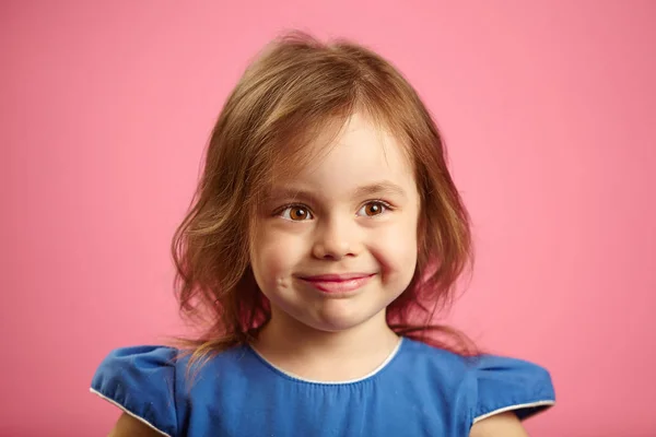 stock image Children close-up portrait of beautiful girl with pretty eyes on isolated pink background.