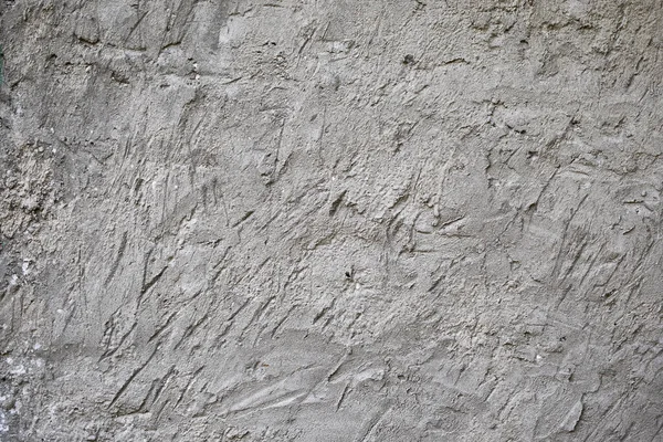 Alçılı gri duvar. Alçı arka plan. Çimento deseni..