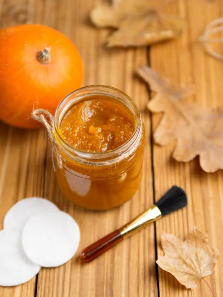 Homemade pumpkin face mask in a glass jar