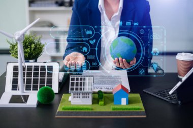 İş adamlarının geri dönüşüm planı ve tartışması ofis toplantı odasında yeniden kullanım politikası sembolünü azaltır. Yeşil iş şirketi ve Güneş Enerjisi Çevre Kenti Kavramı