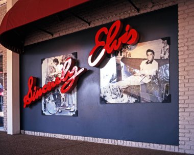 MEMPHIS, USA - NOVEMBER 21, 1995 - Sincerely Elvis sign and photographs at Graceland, the home of Elvis Presley, Memphis, Tennessee, United States of America, November 21, 1995. clipart