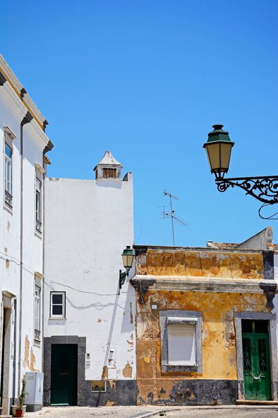 Traditional Portuguese buildings along the Rua do Minicipio in the old town part of the city, Faro, Algarve, Portugal, Europe.