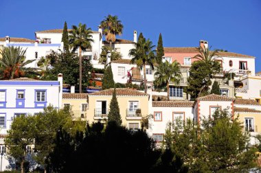 Pretty townhouses and apartments on the hillside, La Heredia, Malaga Province, Andalucia, Spain, Europe clipart