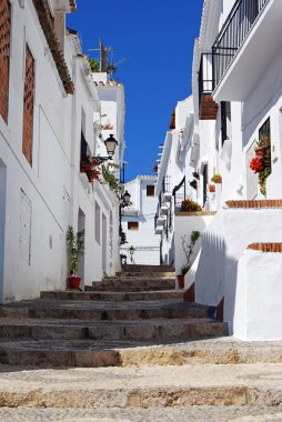 View along a typical street in the whitewashed village, Frigiliana, Malaga Province, Andalucia, Spain, Europe. clipart